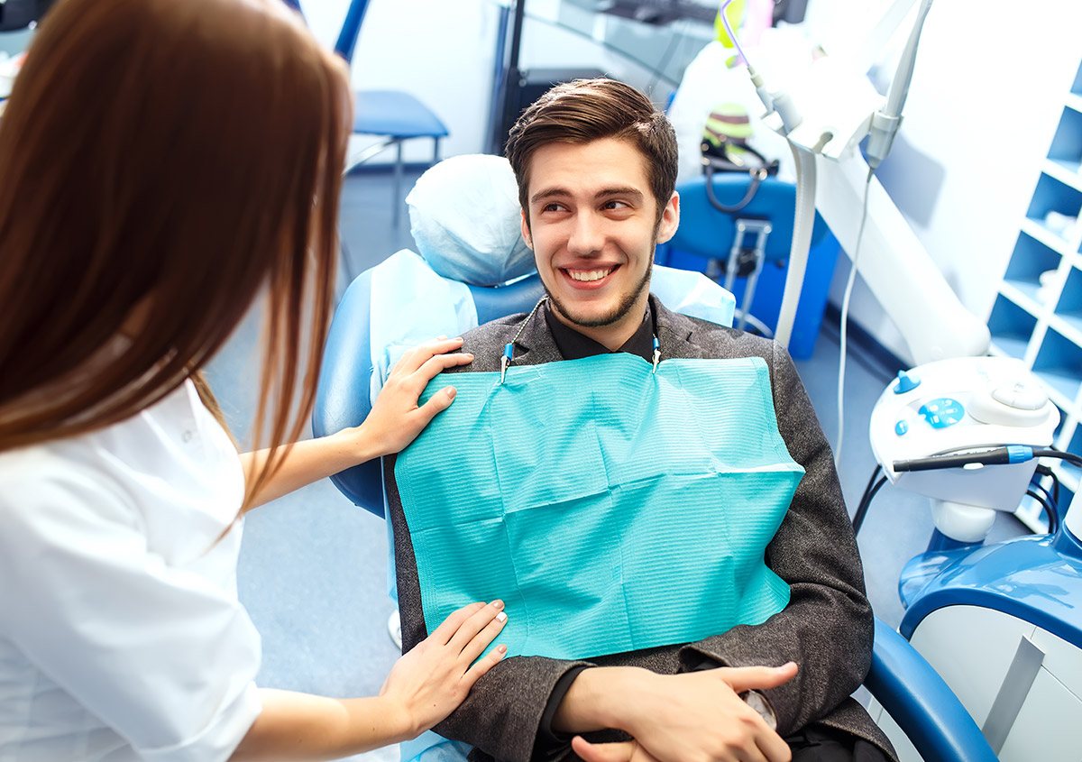 Patient smiling at the dental